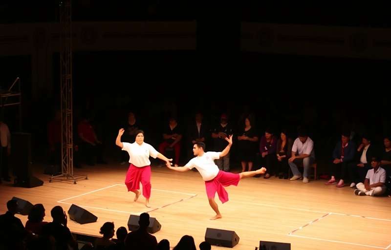 Valpoi Victory national tournament finals in New Delhi with players competing on stage and large audience